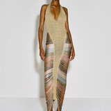 Model wearing KABE SHOP INC Melissa halter neck midi dress in metallic gold with multi-colored corded fringe detail.