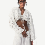 KABE SHOP INC Menorca trousers in white cotton with intricate lace detailing worn by a model in a studio setting