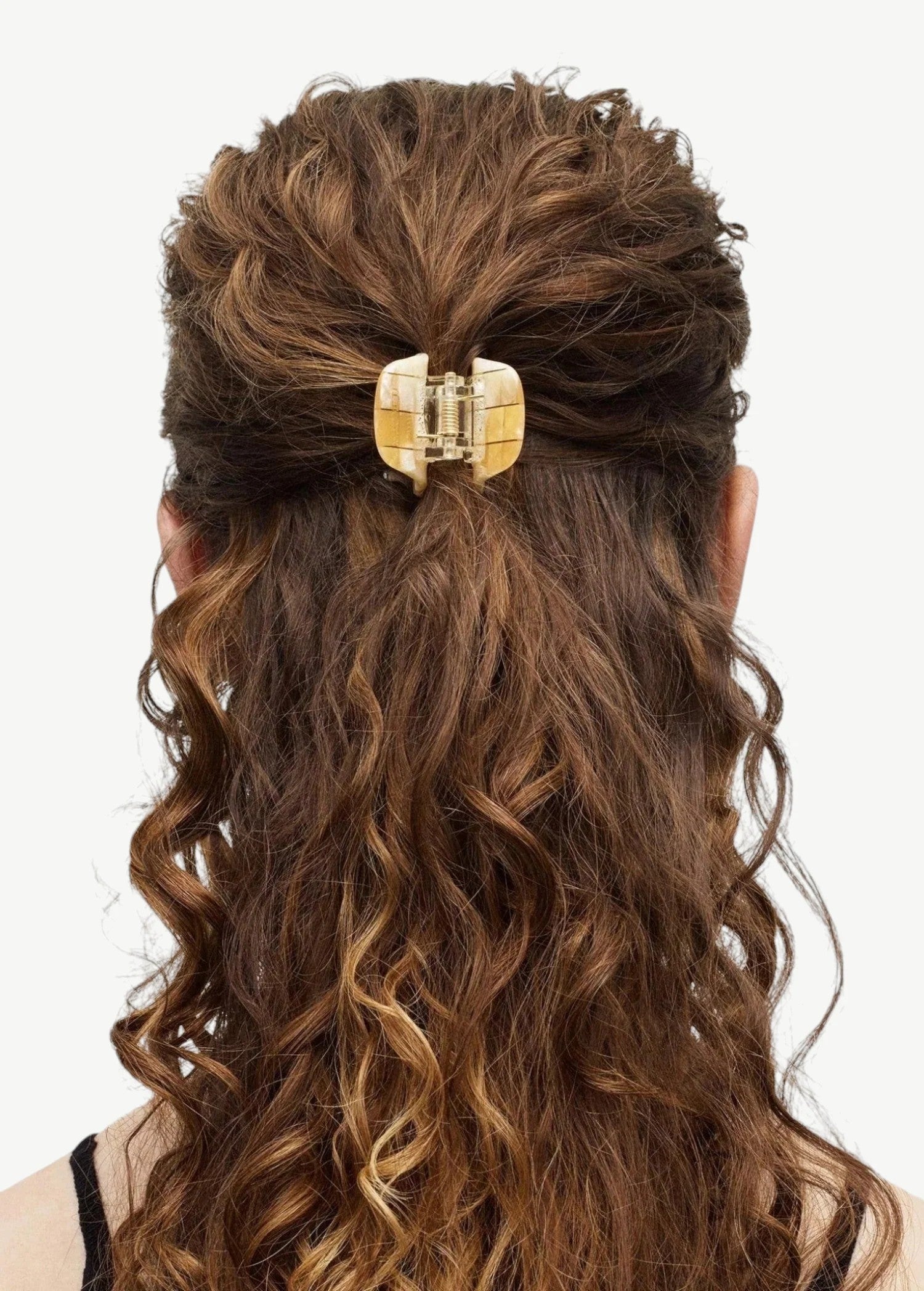KABE SHOP INC mini claw hair clip in cream and brown bio-acetate holding half-up curly hair