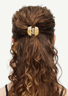 KABE SHOP INC mini claw clip in beige bio-acetate holding half-up curly hair