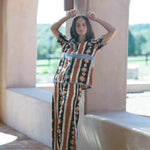 KABE SHOP INC Nera wide leg pants featuring a tribal ikat print in brown, black, and white, worn with matching top.