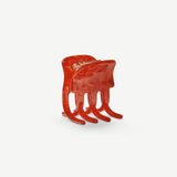 KABE SHOP INC handcrafted mini hair claw clip in translucent orange Italian bio-acetate for all hair types
