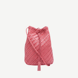 KABE SHOP INC Pompom Double Jump Bag in pink woven buffalo calf leather with a crossbody strap and tassel detail.