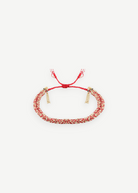 KABE SHOP INC N° 183 braided bracelet in red and gold with delicate tassel charms and adjustable cord closure