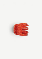 KABE SHOP INC mini claw hair clip in a glossy red marbled Italian bio-acetate finish