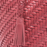 KABE SHOP INC Pompom Double Jump Bag in red woven buffalo calf leather with a braided tassel detail