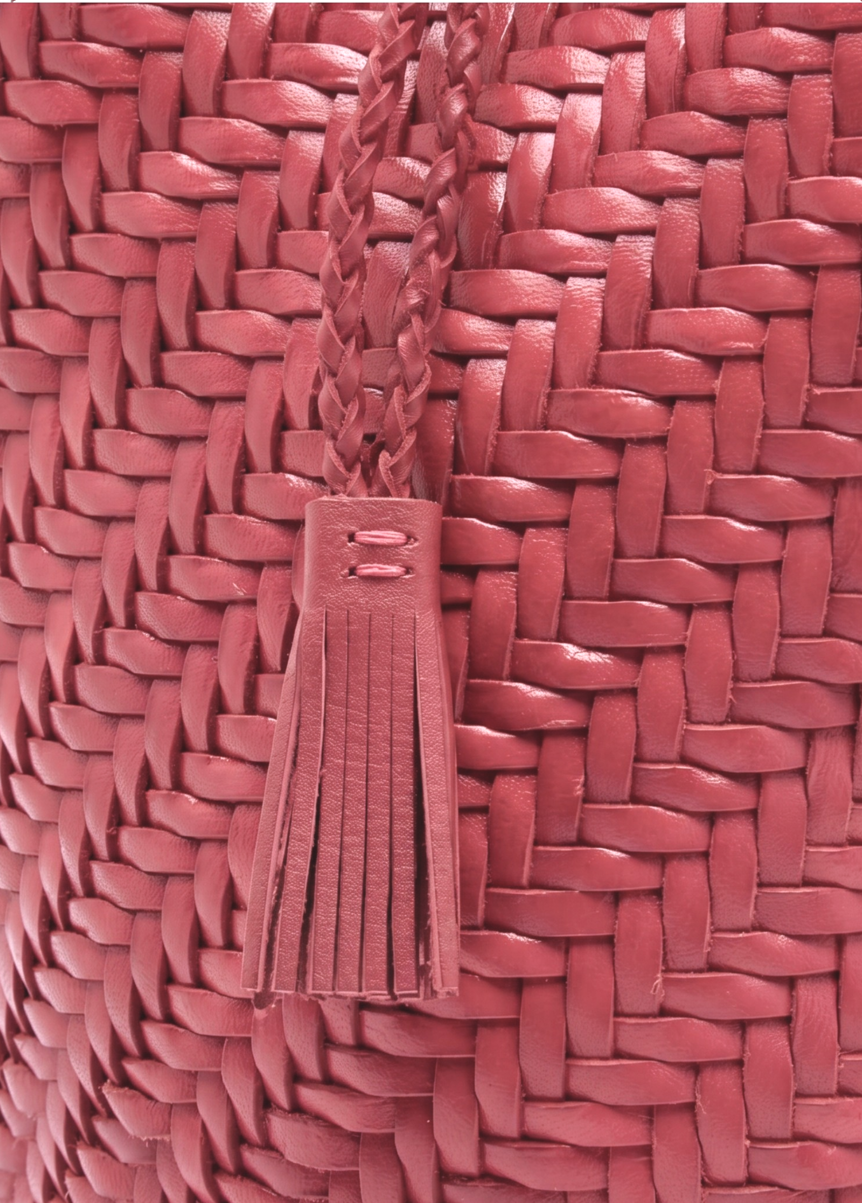 KABE SHOP INC Pompom Double Jump Bag in red woven buffalo calf leather with a braided tassel detail