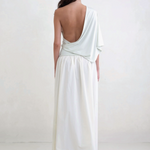 Back view of a woman wearing a KABE SHOP INC Rhea maxi skirt in white with an adjustable waistband