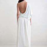 Back view of a woman wearing a KABE SHOP INC Rhea maxi skirt in white with an adjustable waistband