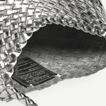 KABE SHOP INC Rosanna Bag in metallic silver handwoven buffalo leather with a detailed interior weave and shoulder strap