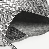KABE SHOP INC Rosanna Bag in metallic silver handwoven buffalo leather with a detailed interior weave and shoulder strap