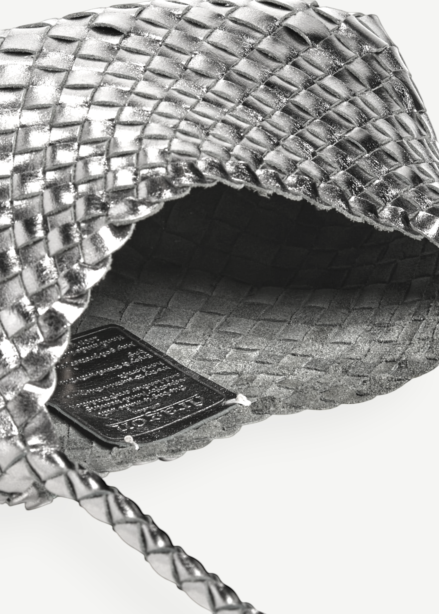 KABE SHOP INC Rosanna Bag in metallic silver handwoven buffalo leather with a detailed interior weave and shoulder strap