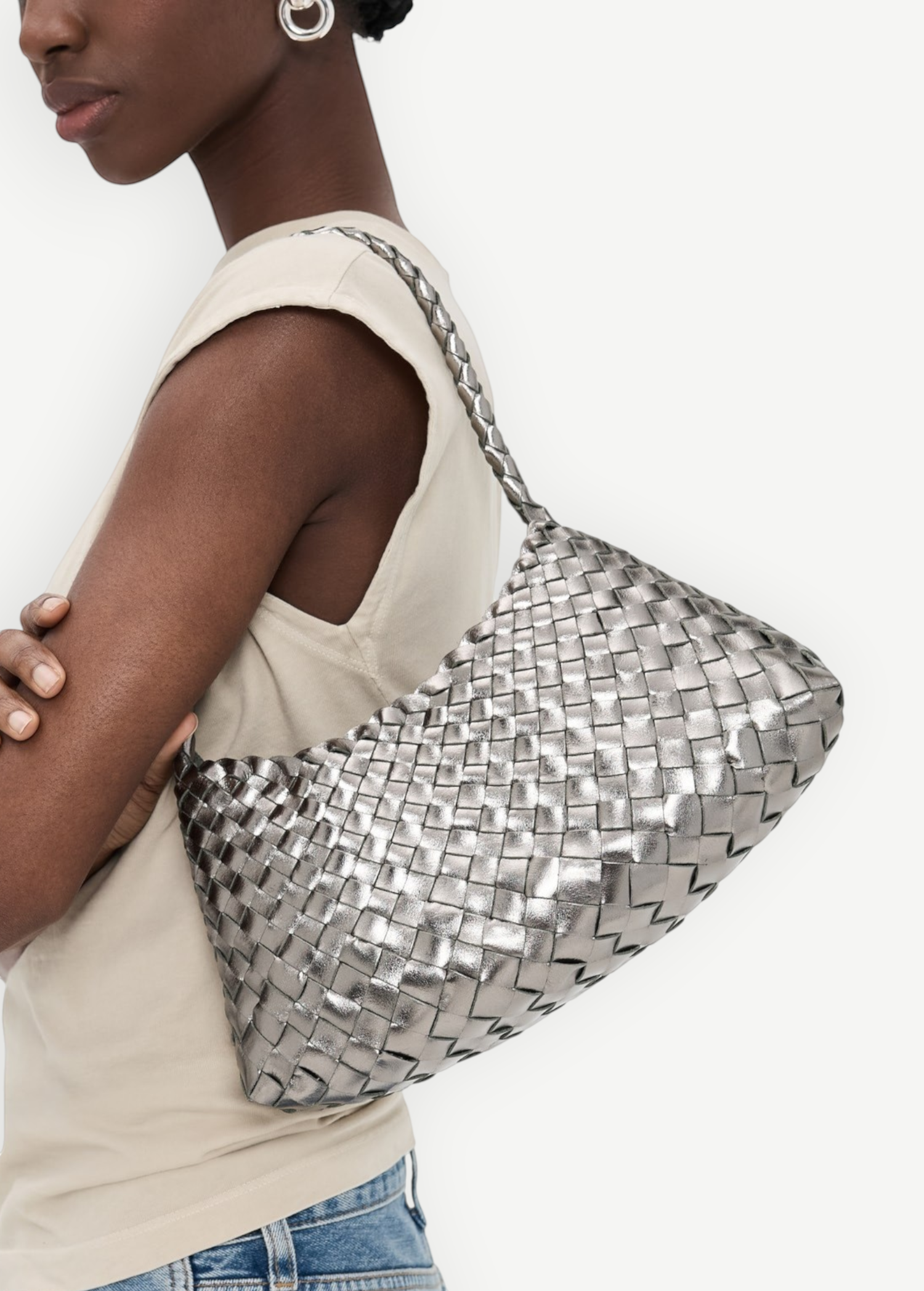 KABE SHOP INC Rosanna Bag in metallic silver handwoven buffalo leather worn over the shoulder by a model