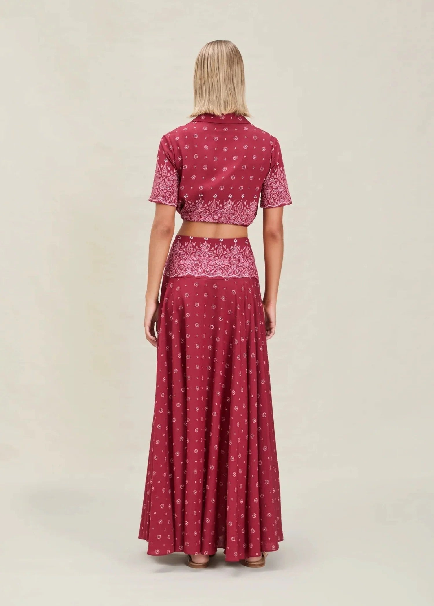 KABE SHOP INC Rylie maxi skirt in red bandana print worn as a set with a matching crop top, back view