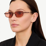 KABE SHOP INC Sera rectangular sunglasses in matte brown stainless steel with rose-tinted lenses on a model