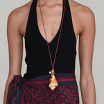 KABE SHOP INC shell necklace featuring a natural seashell pendant and colorful stone accents on adjustable leather cord