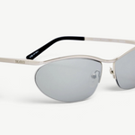 KABE SHOP INC Charlotte cat-eye sunglasses with silver-tone metal frames and dark gray lenses, side view.