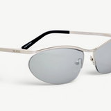 KABE SHOP INC Charlotte cat-eye sunglasses with silver-tone metal frames and dark gray lenses, side view.