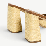 KABE SHOP INC Sloane Heel sandal featuring a tan leather insole and a chunky block heel wrapped in natural raffia