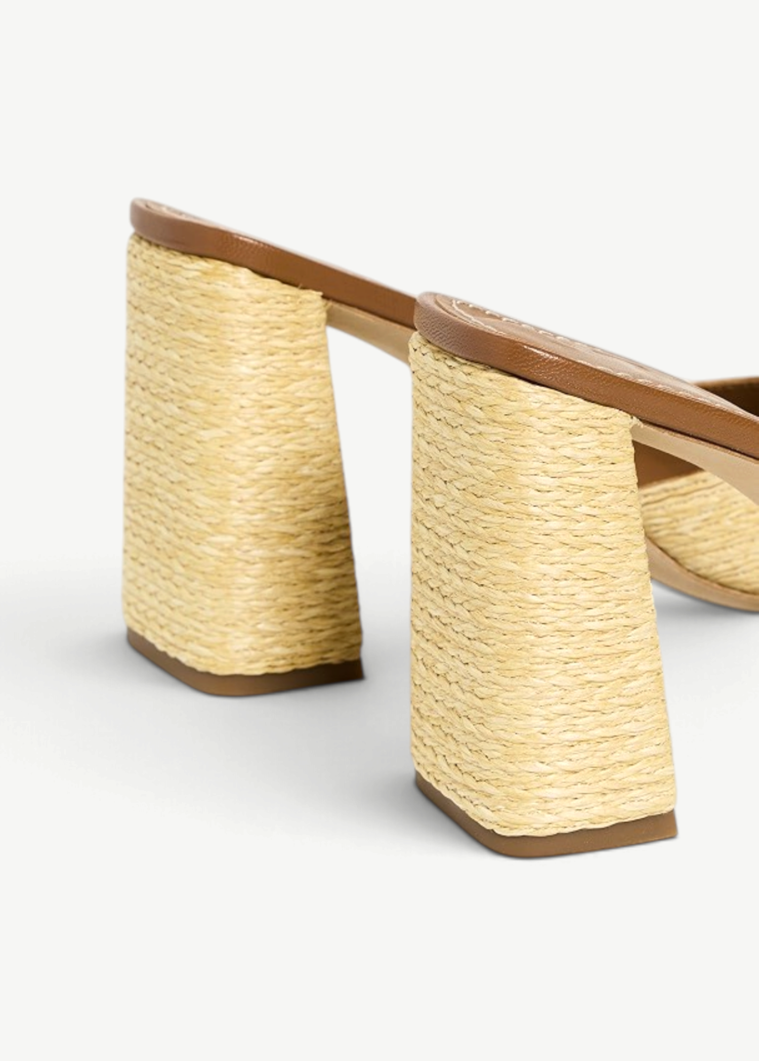 KABE SHOP INC Sloane Heel sandal featuring a tan leather insole and a chunky block heel wrapped in natural raffia