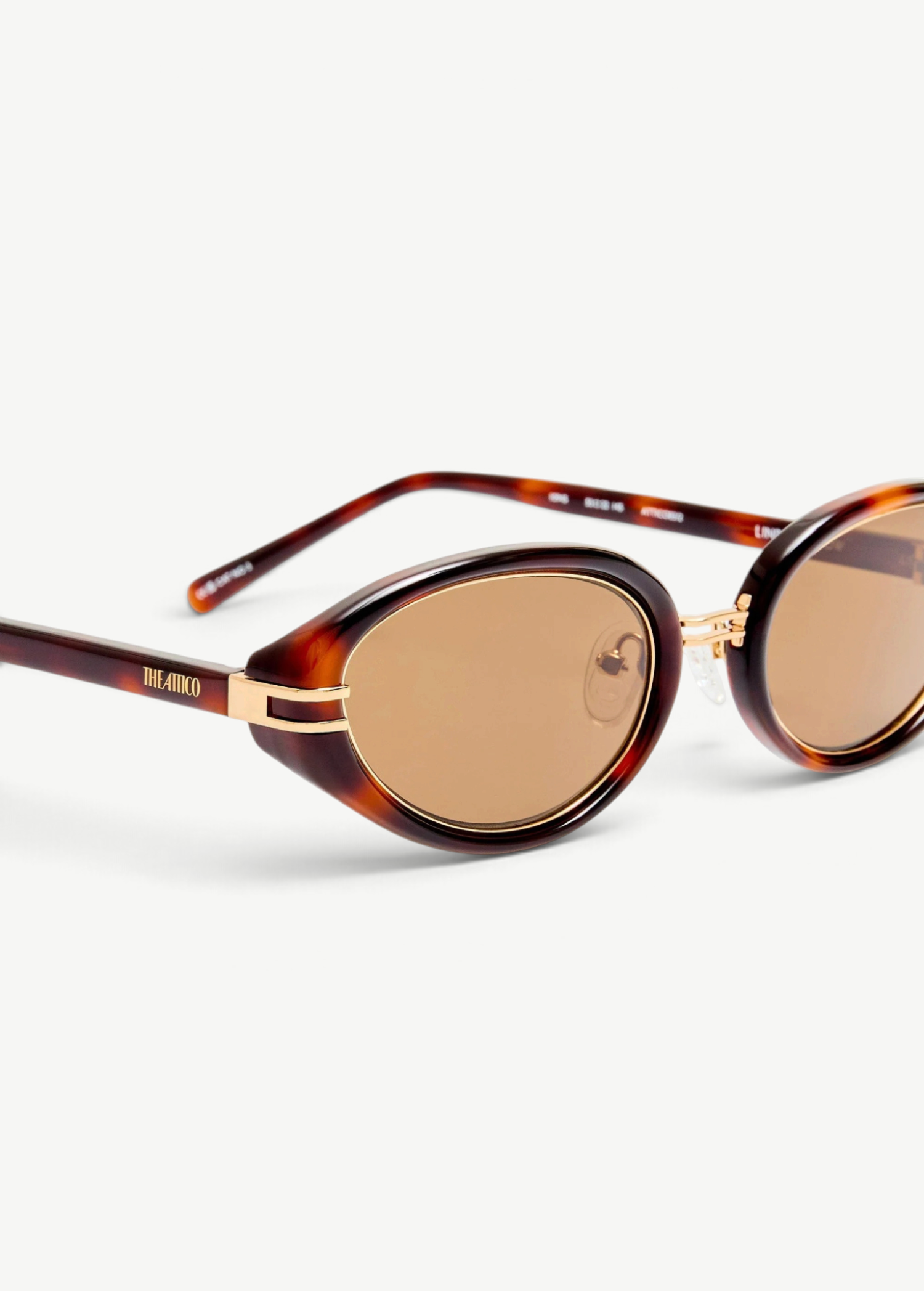 KABE SHOP INC Ambra oval sunglasses featuring a tortoiseshell frame, gold-tone accents, and brown gradient lenses.