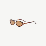 KABE SHOP INC Ambra oval sunglasses featuring a tortoiseshell frame, brown gradient lenses, and gold-tone metal accents.