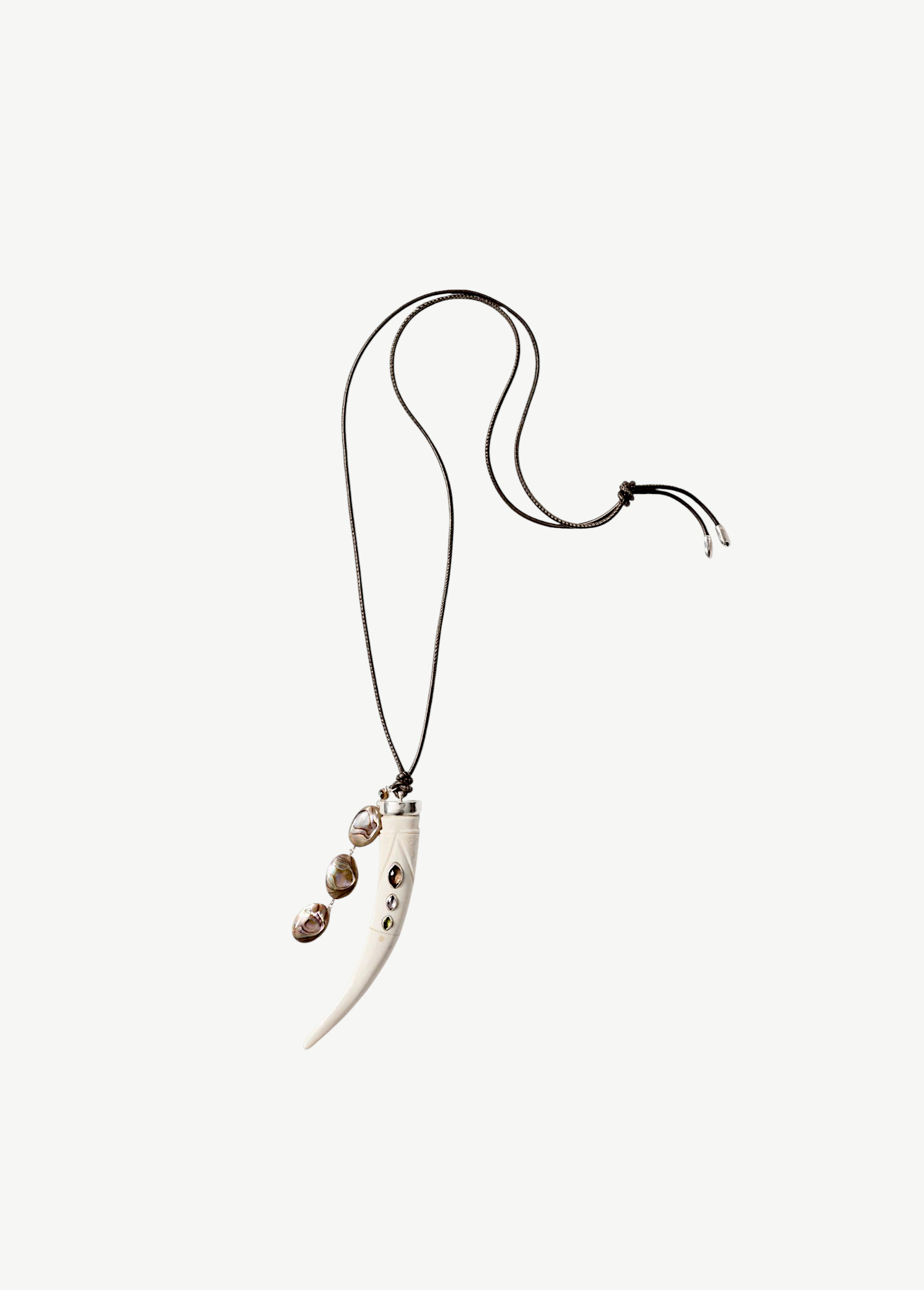 KABE SHOP INC Tusk Charm Necklace with carved white bone pendant, gemstone inlay, and cascading abalone tassel on cord
