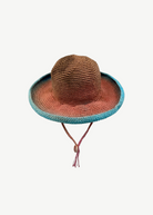 KABE SHOP INC Wika crochet hat featuring a vibrant tie-dye gradient in brown, orange, and blue with a chin strap.