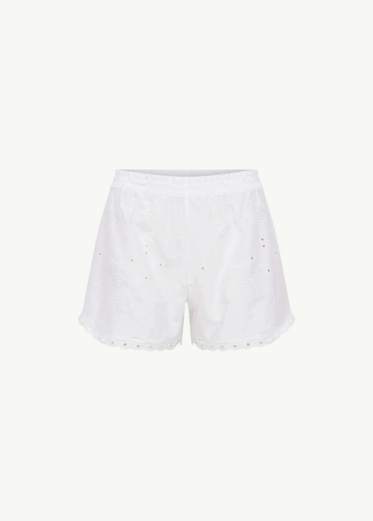 KABE SHOP INC Kira white summer shorts featuring delicate floral eyelet embroidery and a scalloped hem.