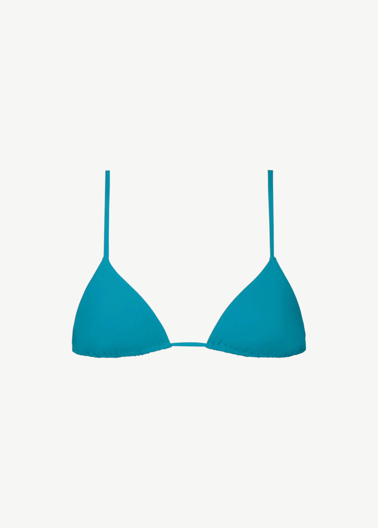 The Equator Top is a bright blue triangle bikini top with thin straps, crafted from eco-friendly ECONYL® regenerated polyamide swimwear fabric, and displayed against a white background.