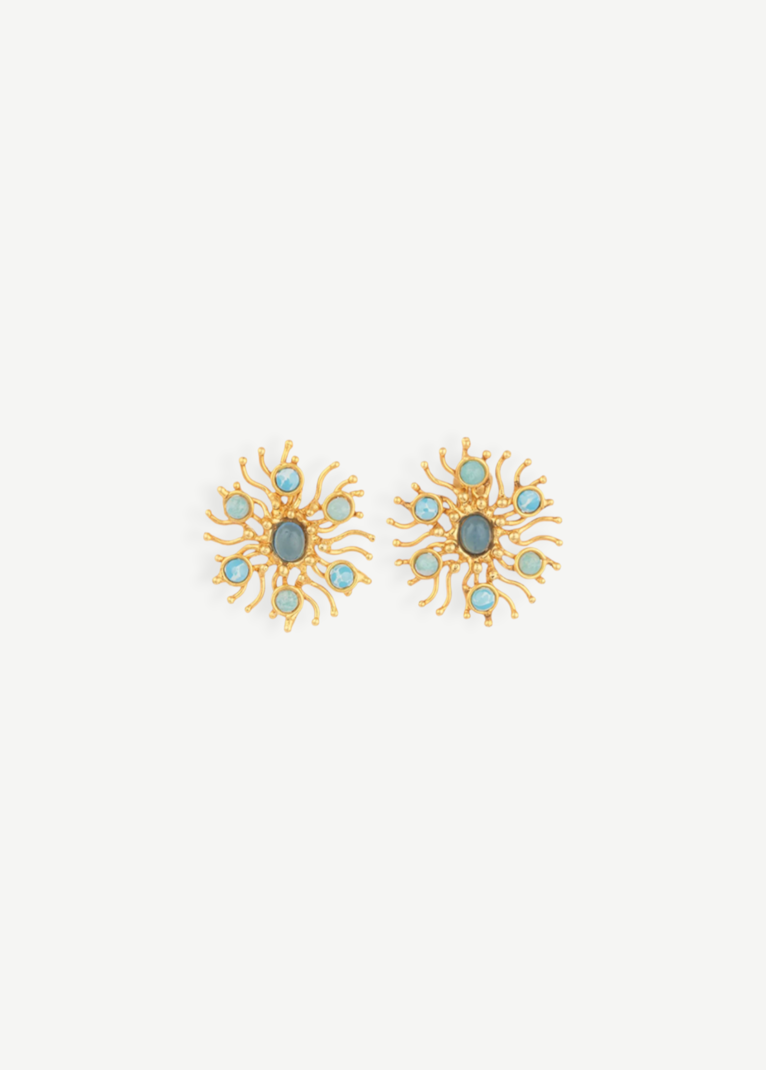 KABE SHOP INC Sunshine earrings featuring gold sunburst designs with blue chalcedony and larimar gemstones.