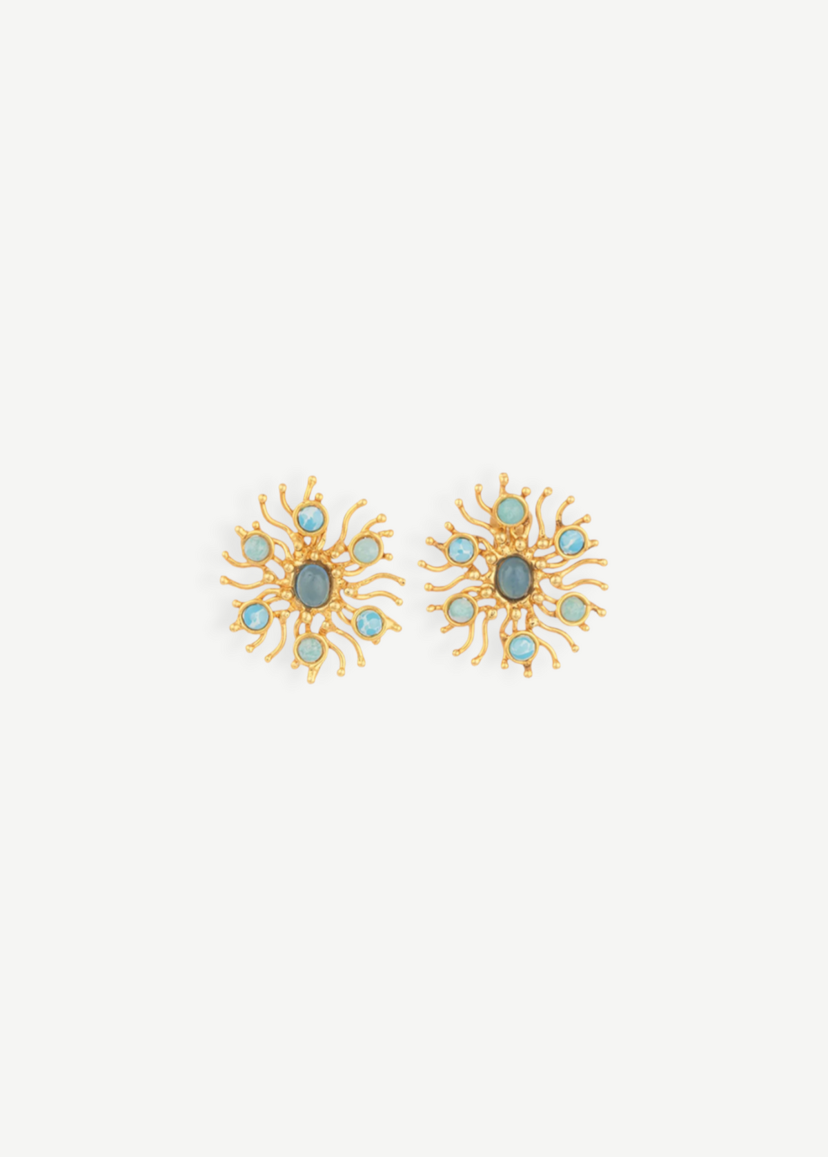 KABE SHOP INC Sunshine earrings featuring gold sunburst designs with blue chalcedony and larimar gemstones.