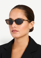 KABE SHOP INC Libby sunglasses with angular tortoiseshell acetate frames and brown lenses worn by a model