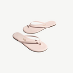 KABE SHOP INC Lily Glosses pale pink patent leather flip flops with cushioned insoles and rubber outsoles.