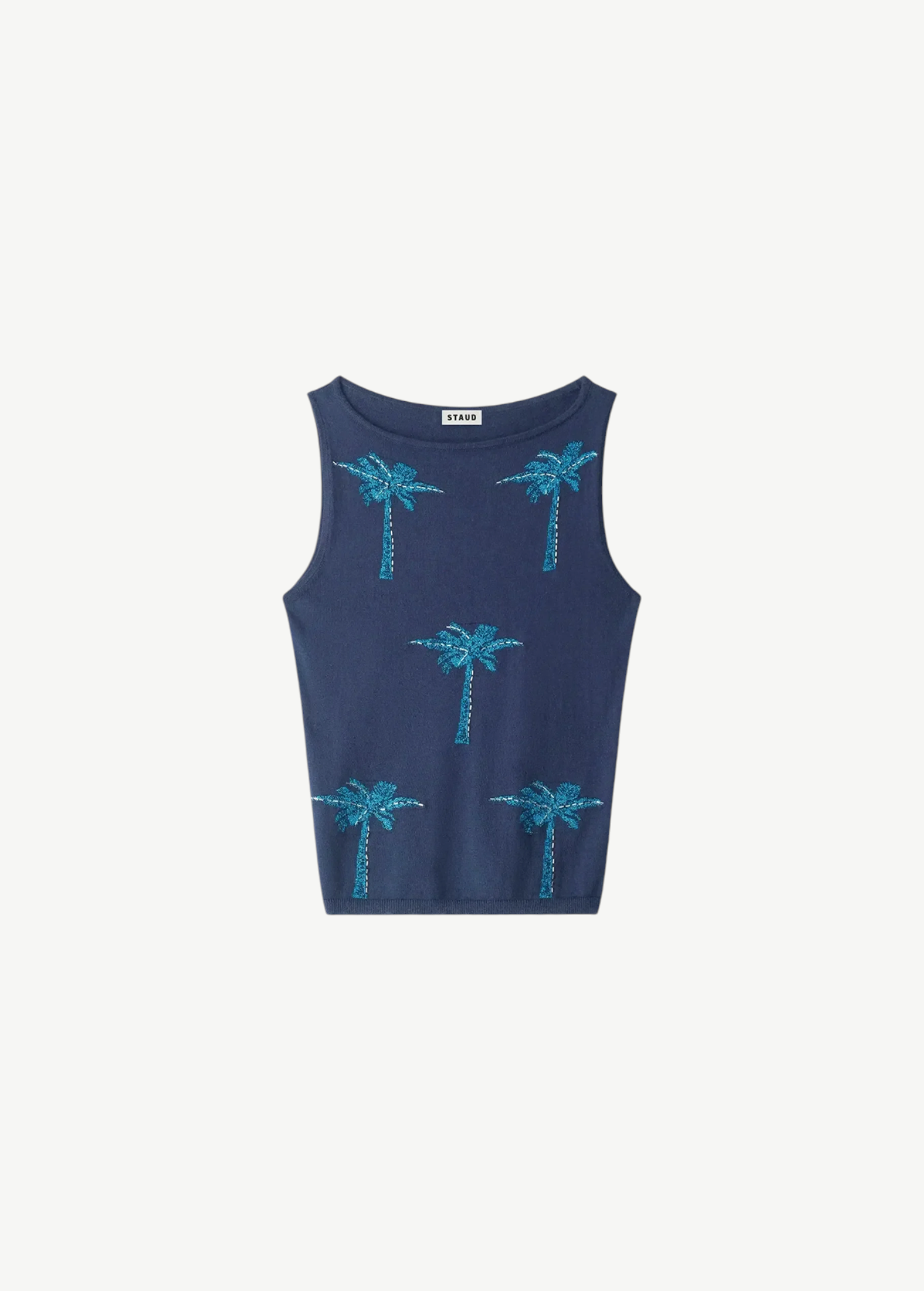 Arden Top, a navy blue sleeveless knit featuring a pattern of five embroidered turquoise palm trees, a warm-weather essential.