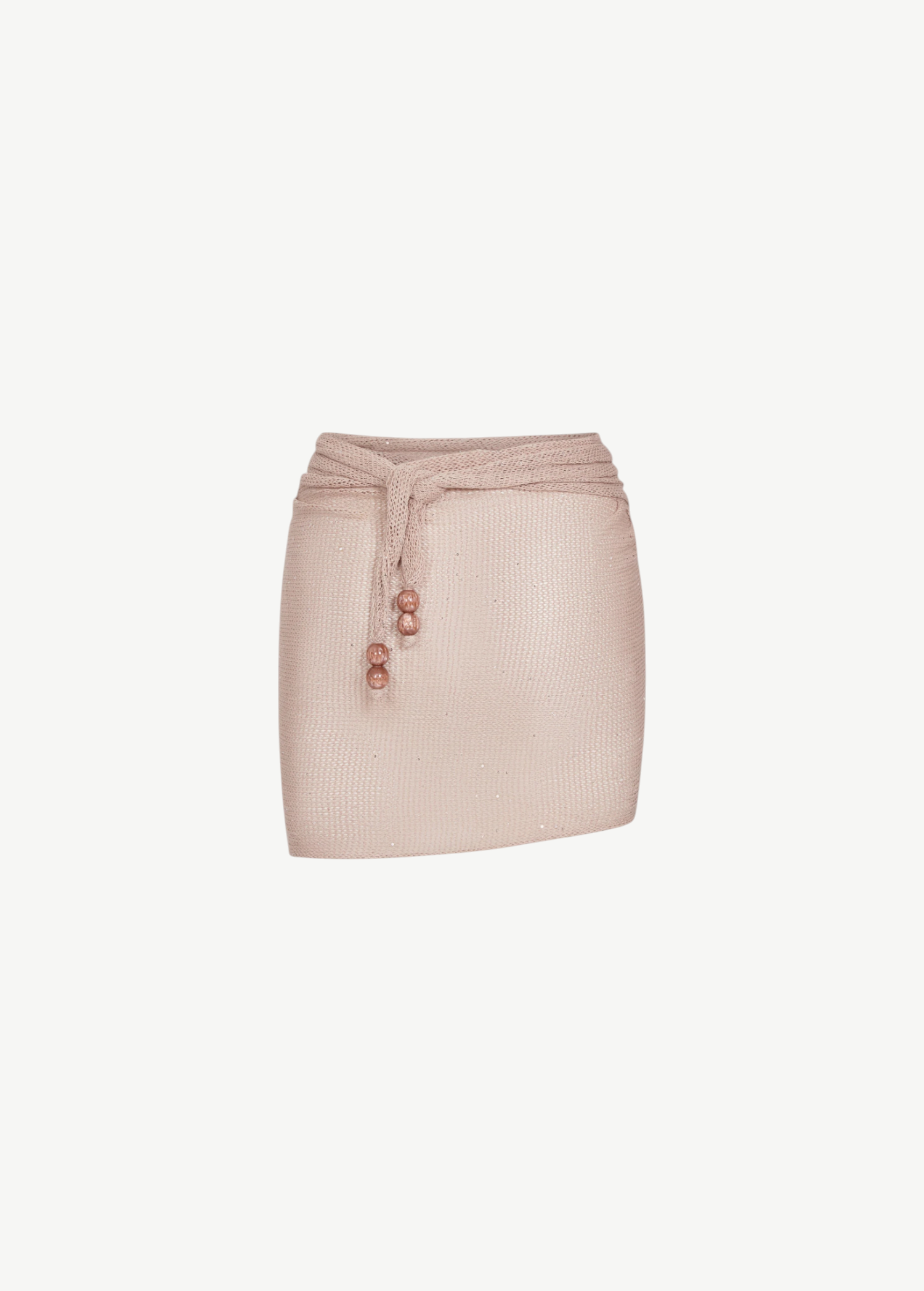 The Lumiere Skirt is a pale pink textured mini skirt featuring a matching waist tie with three round beads on each end and delicate sequin bead accents, shown against a plain white background.