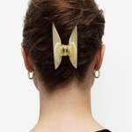 KABE SHOP INC Midi Heirloom claw clip in cream acetate holding hair in an elegant updo