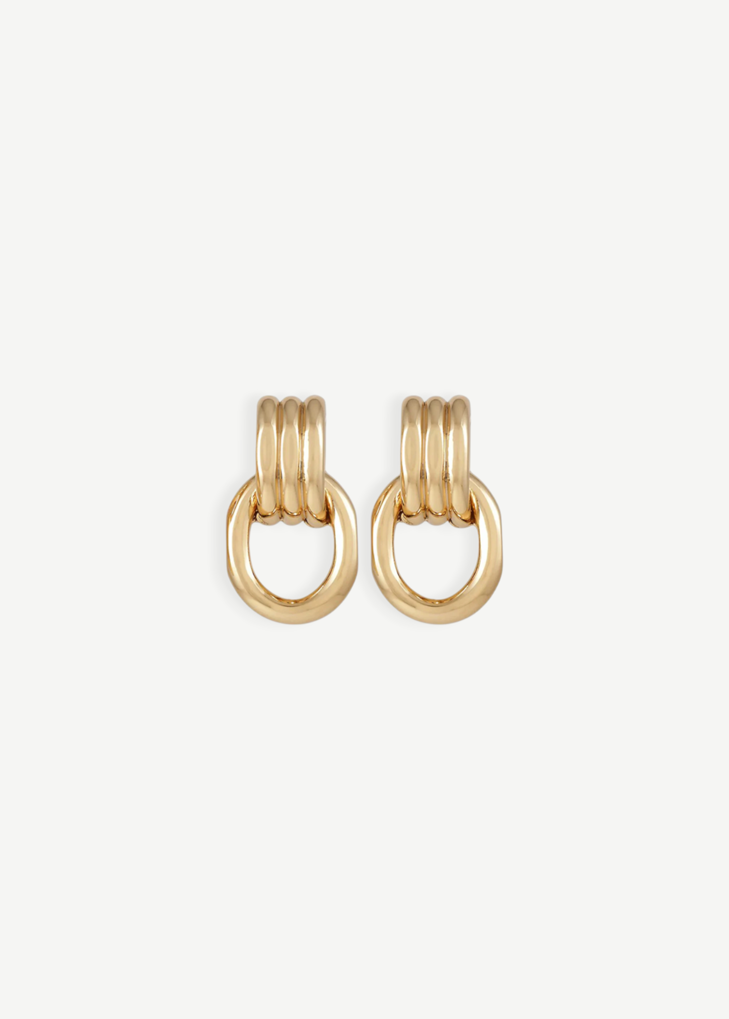 Elsa Earrings feature a pierced back and three rounded gold-plated bars stacked above a thick, oval-shaped loop, shown against a plain white background. Crafted with 14KT gold plating, these earrings are stylish, lightweight, and ideal for everyday wear.