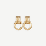 Elsa Earrings feature a pierced back and three rounded gold-plated bars stacked above a thick, oval-shaped loop, shown against a plain white background. Crafted with 14KT gold plating, these earrings are stylish, lightweight, and ideal for everyday wear.