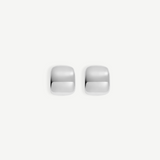 Two small, shiny Pebble Earrings with a square shape and rounded edges are placed side by side on a plain white background. Each earring measures approximately 1 inch in length and features a lustrous rhodium plate finish.