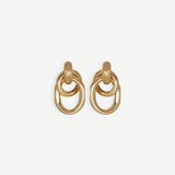 The Ami Earrings are a pair of pierced back earrings, each showcasing three interlocking circular loops, beautifully crafted in 14KT gold plate with an elegant 1.5-inch drop, shown against a plain white background.