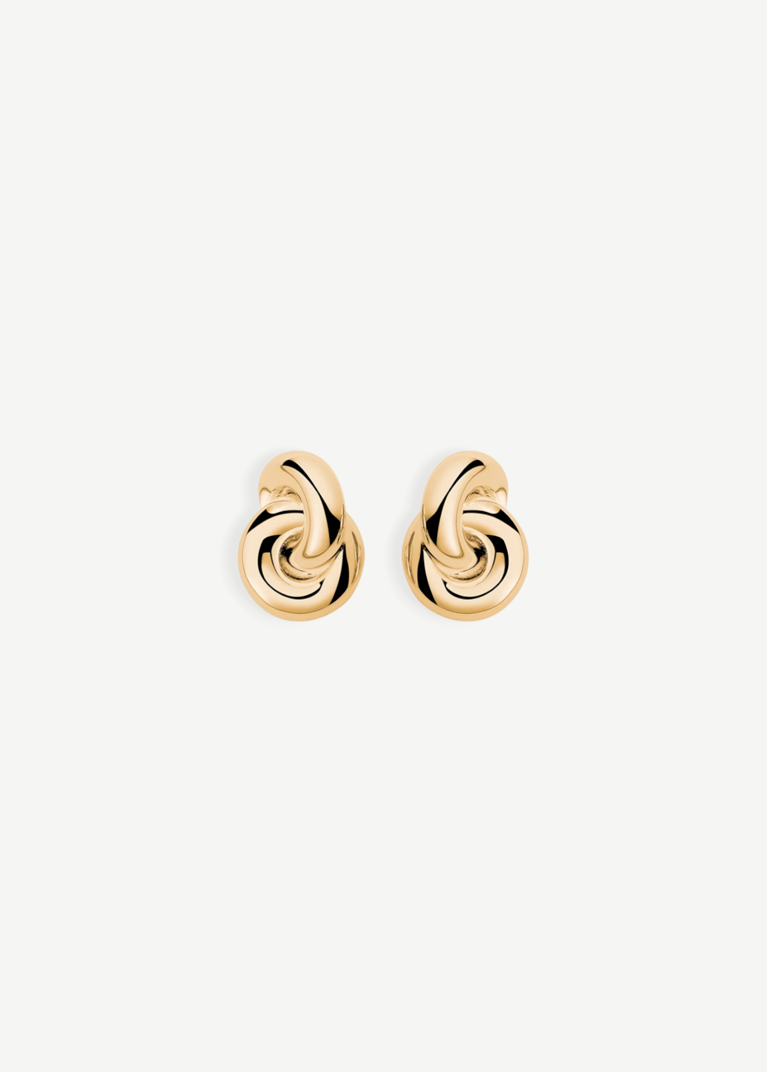 The Amina Earrings are displayed on a plain white background. These elegant earrings feature a gold-plated, intertwined looped design with a smooth, polished finish and a classic pierced back for secure wear.