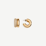 Introducing the CZ Double Hoop Earrings: a pair of elegant 14KT gold-plated double hoops, featuring one side exquisitely encrusted with pave cubic zirconia for added brilliance. One earring is showcased from the front to highlight its captivating sparkle, while the other is displayed from the side to reveal the sleek post and secure clasp.