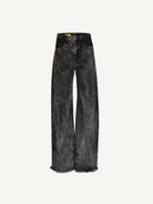 The Acid Wash Boyfriend Jeans are wide-leg, high-waisted black jeans made from acid wash denim with a distinctive gray wash pattern and raw, frayed hems, shown against a plain white background.