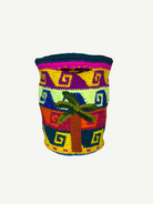 Introducing the Palmeras Bag Sac: a vibrant, handwoven basket bag adorned with geometric patterns and a distinctive palm tree motif on the front. Featuring bold stripes in yellow, green, purple, pink, and blue, this colorful handmade bag is both eye-catching and practical.