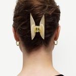 KABE SHOP INC Midi Heirloom Claw in cream Italian acetate worn in a woman's hair from a back view