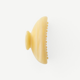 KABE SHOP INC Midi Heirloom claw clip in translucent cream Italian acetate with a curved double-walled design.