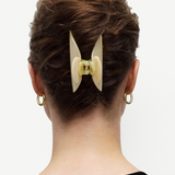 KABE SHOP INC Midi Heirloom hair claw in cream Italian acetate worn in a brown updo hairstyle