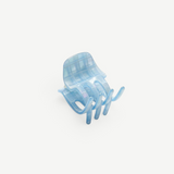 KABE SHOP INC mini claw hair clip in translucent light blue Italian bio-acetate with a subtle grid pattern