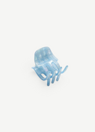 KABE SHOP INC mini claw hair clip in translucent light blue Italian bio-acetate with a subtle grid pattern